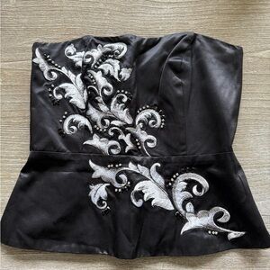 White House Black Market Black embellished corset top, size 4. Hidden zipper.
